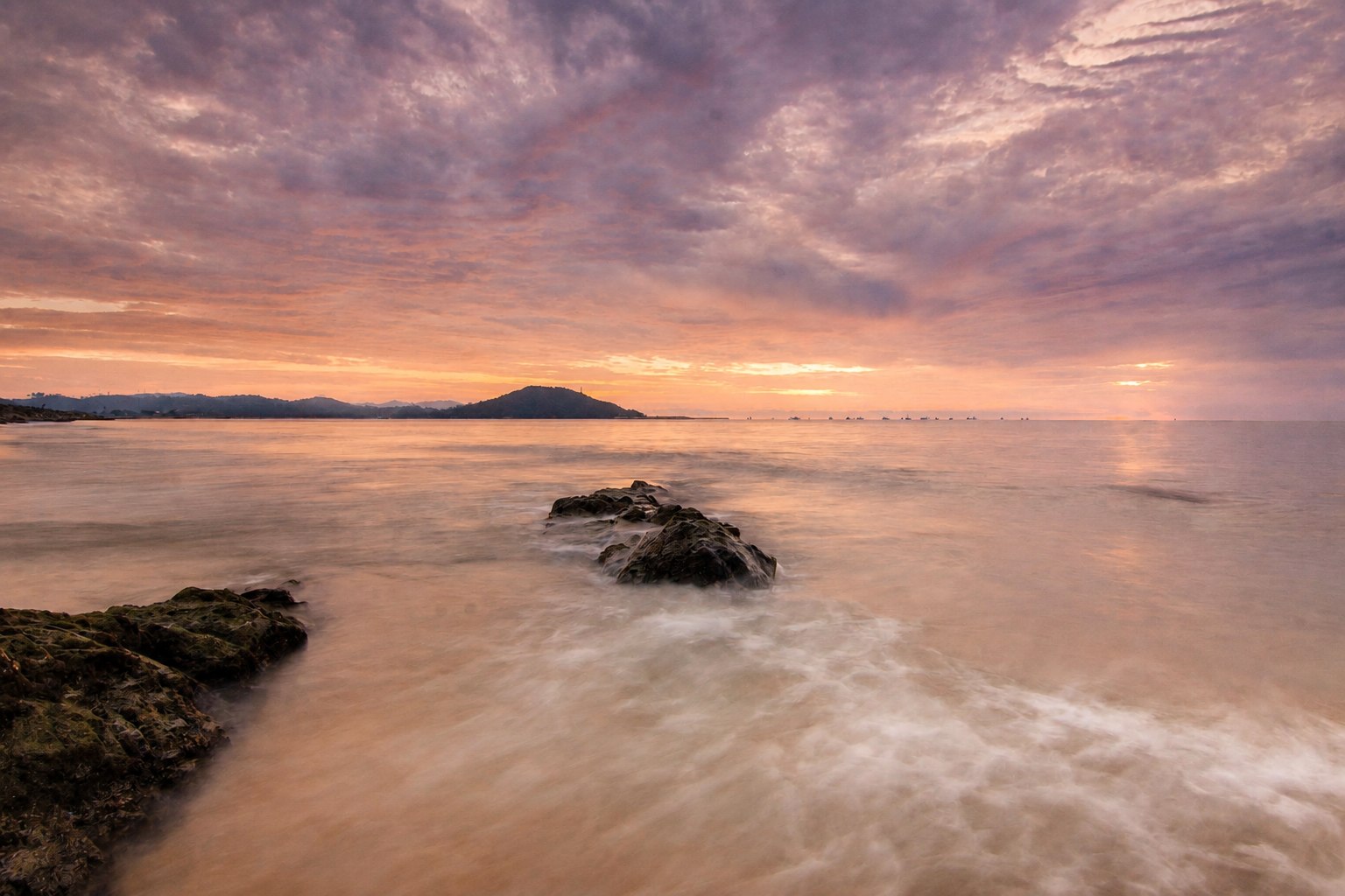 Calm ocean at sunset